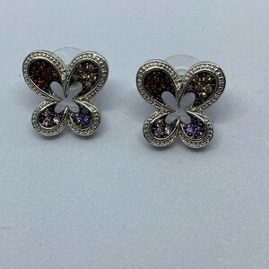 Silver tone CZ pierced earrings.